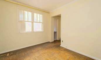 Imagem 4: Casa à venda no centro de Pelotas - com 109 m², 3 quartos, cozinha com armários, lareira e