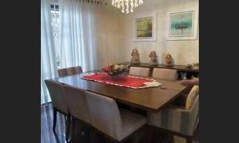 Imagem 6: Casa para venda com visual da sala de visitas para o mar. Rua somente de residencias. Bem