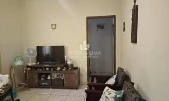 Imagem: Casa térrea com dois quartos, sala, cozinha