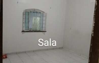 Imagem 3: Casa com três quartos, sala, cozinha, lavanderia e garagem