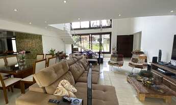 Imagem 5: Casa de luxo em condomínio fechado com vista para campo de golf e área de preservação