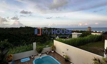 Imagem: Casa à venda com piscina e vista para o