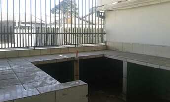 Imagem 5: Prédio comercial na principal rua do bairro