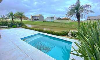 Imagem 2: Casa nova beira lago com piscina de concreto