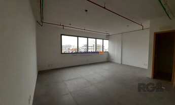 Imagem 2: Excelente sala comercial no Menino Deus, com uma vaga de garagem