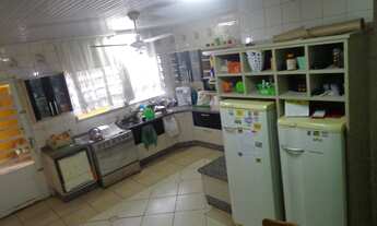 Imagem 5: Casa térrea 4 dormitórios 2 suíte pátio grande bairro Camaquã - Porto Alegre RS