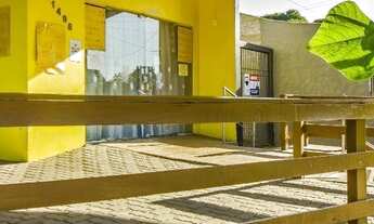 Imagem: Prédio comercial e casa nos fundos