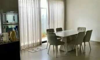 Imagem 4: Casa moderna com piscina e área gourmet