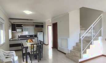 Imagem: SOBRADO PRÓXIMO AO MAR E A PLATAFORMA DE