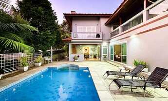 Imagem 2: Casa no condomínio Morada das Estrelas para venda e locação com 6 quartos, sendo 6 suítes