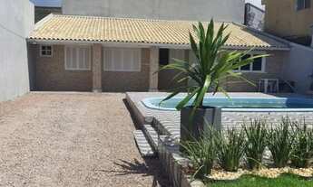 Imagem: Casa com piscina de barbada em Imbé/RS