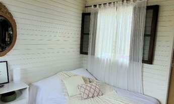 Imagem: Suíte em casa compartilhada na praia do