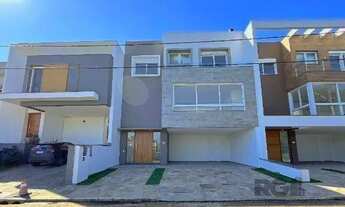 Imagem 2: Casa Condominio em Porto Alegre, no bairro Hípica, com 3 dormitório(s), e 3 banh