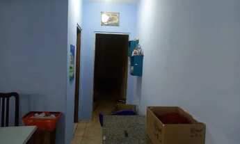 Imagem 6: Salão grande com casa nos fundos