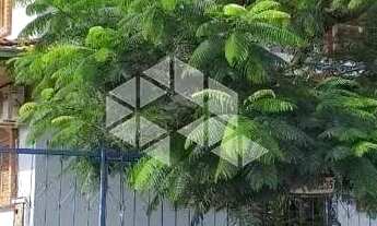 Imagem: Casa Localizada Em Rua Asfaltada