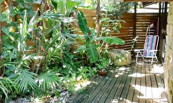 Imagem 6: Suíte em casa compartilhada na praia do campeche