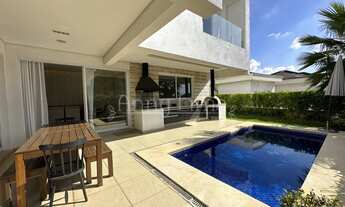 Imagem 5: Casa totalmente mobiliada com 4 amplas suítes, piscina e churrasqueira para locação e vend