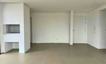 Imagem 6: Descubra o seu novo lar em um moderno edifício no coração da cidade de Torres