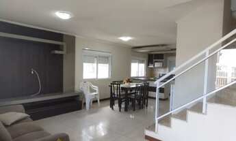 Imagem 4: SOBRADO PRÓXIMO AO MAR E A PLATAFORMA DE PESCA, EM TRAMANDAÍ