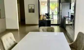 Imagem 5: Casa moderna com piscina e área gourmet