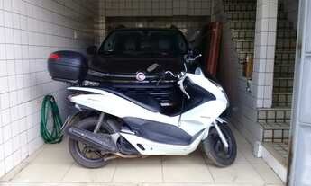 Imagem 3: Casa a venda três pavimento, 2/4, uma suíte ,garagem fechada. Avalio receber veículo parte