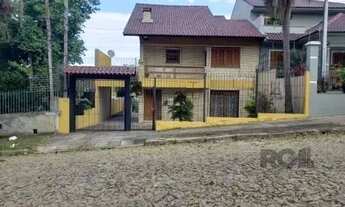 Imagem: Sobrado Térreo com 3 Dormitórios para