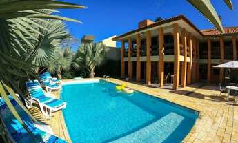 Imagem 2: Casa com piscina e ar + 5 suítes, 550 m² - venda por R$ 2.950.000 ou aluguel por R$ 2.800