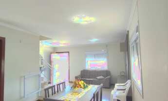 Imagem 6: SOBRADO PRÓXIMO AO MAR E A PLATAFORMA DE PESCA, EM TRAMANDAÍ