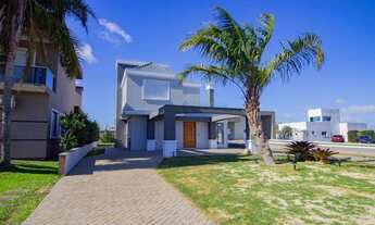 Imagem 3: Casa de condomínio térrea para venda possui 160 metros quadrados com 4 quartos