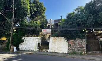 Imagem: Terreno de 326m², com 02 casas de Madeira