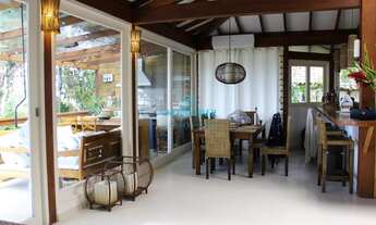 Imagem 4: Casa charmosa em condomínio, em meio a natureza com 4 suítes à venda a apenas 100mts da pr