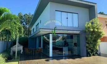 Imagem 2: Casa para venda em condomínio fechado com 4 suítes, todas mobiliadas por 2.100.000 Reais