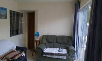 Imagem 6: Amplo terreno com casa, fronte à rodovia