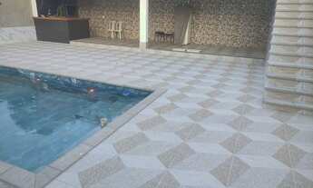 Imagem 3: Área de piscina com churrasqueira