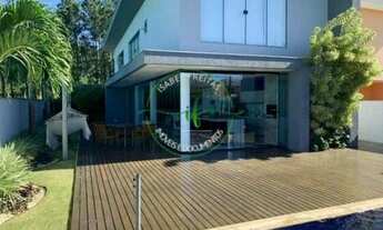 Imagem 3: Casa para venda em condomínio fechado com 4 suítes, todas mobiliadas por 2.100.000 Reais