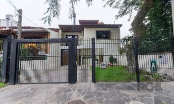 Imagem 2: Excelente casa de 379m² com 3 dormitórios, piscina e 4 vagas