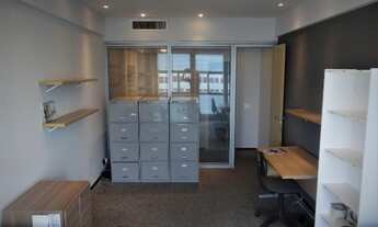 Imagem 7: Sala com 33 M². Andar alto. Vista total