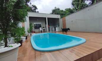 Imagem: Casa com piscina na região da cidade operária