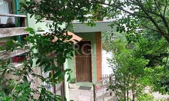 Imagem 7: Terreno de 5.280 m², com 3 casas, no bairro Ponta Grossa, em Porto Alegre