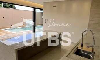 Imagem 7: Casa à venda no Setor Garavelo 3 suítes, área gourmet e piscina aquecida, próxima ao Jard