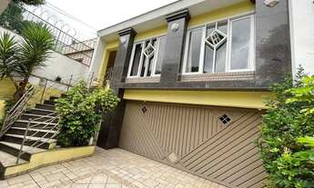 Imagem 2: Linda casa com área gourmet coberta e 4 vagas para locação no Boaque da saúde