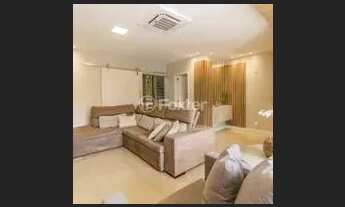 Imagem 4: Sobrado para venda possui 209 metros quadrados com 4 quartos em Jardim Itu - Porto Alegre