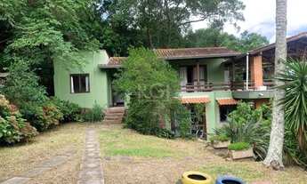 Imagem: Terreno de 5.280 m², com 3 casas, no bairro