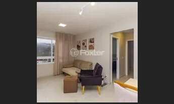 Imagem 2: Apartamento semimobiliado, com 2 quartos, sendo 1 suíte, 1 vaga de estacionamento