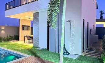 Imagem 4: Sobrado para venda possui 233 metros quadrados com 4 quartos em Cidade Alpha - Eusébio - C