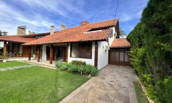 Imagem 4: Casa para aluguel e venda com 300 metros quadrados com 5 quartos.