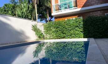 Imagem: Condomínio com piscina a 200 metros da