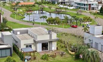 Imagem 3: Casa à venda com 03 suítes e área gourmet no condomínio Dubai em Capão da Canoa. REF