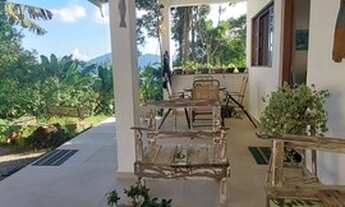 Imagem 6: Casa com piscina e vista pro mar