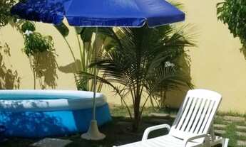 Imagem 2: Belíssima casa 3/4 sendo duas suítes com área verde, em condomínio